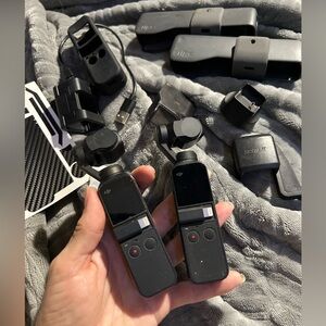 Two DJI Osmo Pocket OT110 Gimbal Cameras (see description)